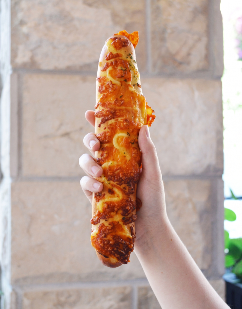 Freshly baked pastry topped with cheese and mayonnaise at Serenada Bistro, a bakery and pastry shop in Dubrovnik.