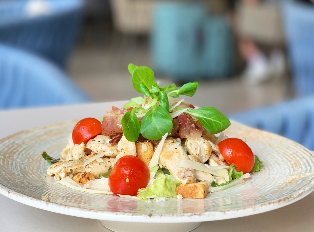 Caesar salad with grilled chicken, parmesan cheese, cherry tomatoes and fresh lettuce at Serenada Bistro near Gruž Port and Dubrovnik Bus Station.
