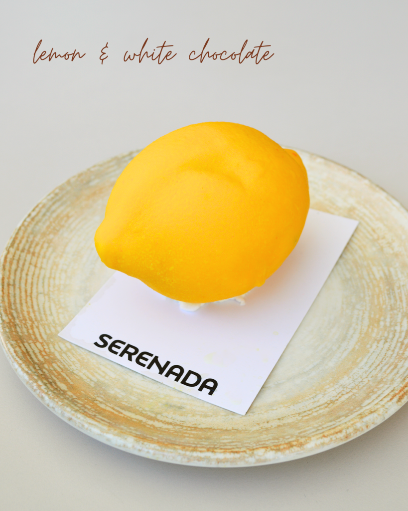Fruity Sin lemon dessert at Serenada Bistro in Dubrovnik - handcrafted lemon-shaped dessert with fresh lemon flavor and smooth white chocolate mousse, a unique artisan dessert experience in Dubrovnik, Croatia.