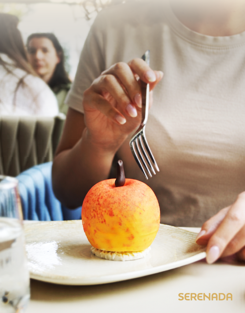 Fruity Sin peach dessert at Serenada Bistro in Dubrovnik - handcrafted peach-shaped dessert with fresh peach and white chocolate mousse, one of the best artisan desserts in Dubrovnik, Croatia.